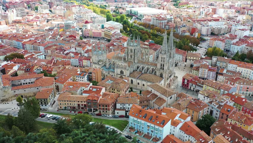 Aerial view of Burgos cathedral in old town along Arlanzon river, Spain.
