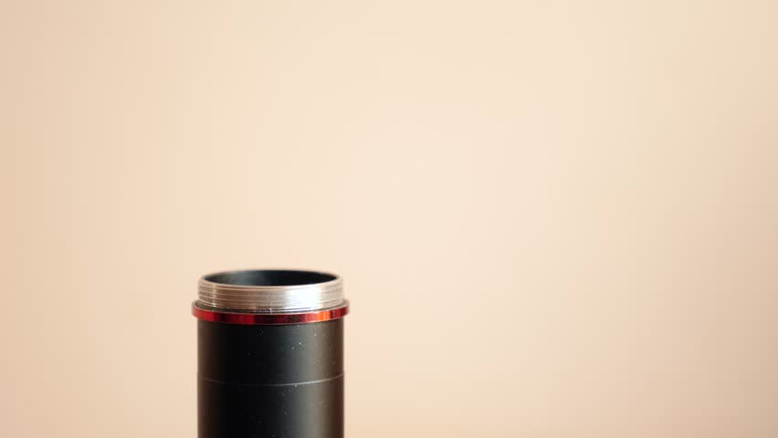 Batteries are inserted into the electronic device. The concept of powering technical gadgets. | Shutterstock HD Video #1100235757