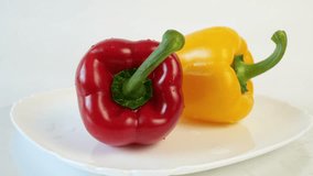 yellow and red bell peppers set isolated on white background, sweet peppers collection. Rotating - Powered by Shutterstock - Get 15% off with code: PIKWIZARD15