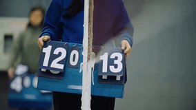 Tennis scoreboard, the referee changes the score manually - Powered by Shutterstock - Get 15% off with code: PIKWIZARD15