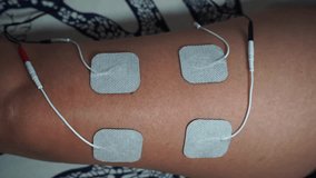 video of electro-stimulator on the leg