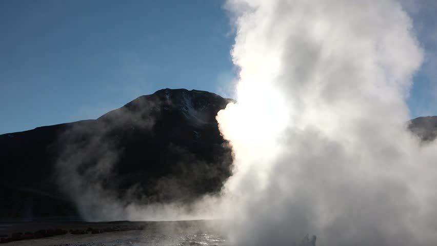 Slow motion. Smoke on the water. Steam over hot water concept of global warming and climate change. Geology. Geothermal fields of planet Earth: Iceland, Chile, New Zealand, USA.