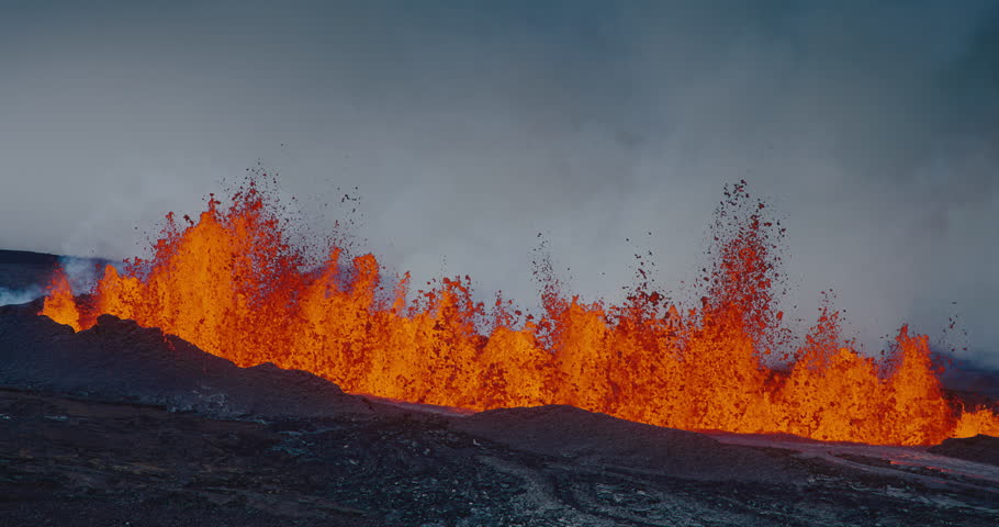 Volcano erupting molten hot lava fountain, Hawaii Mauna Loa volcano eruption of 2022