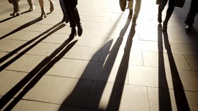 Silhouette of a group of unrecognizable business people talking outdoors in the city street. High quality 4k footage - Powered by Shutterstock - Get 15% off with code: PIKWIZARD15
