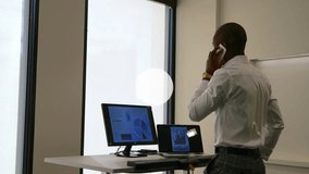 Animation of network of profiles over man talking on smartphone while walking on treadmill at office. Global networking and business technology concept - Powered by Shutterstock - Get 15% off with code: PIKWIZARD15