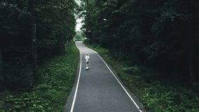 aerial view from woman skateboarding - Powered by Shutterstock - Get 15% off with code: PIKWIZARD15