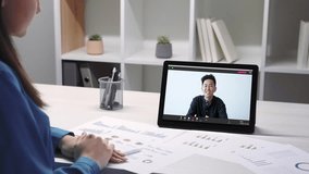 Video report. Virtual conference. Remote presentation. Diverse professional business partners working online with charts graphs using tablet at digital office. - Powered by Shutterstock - Get 15% off with code: PIKWIZARD15