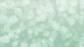Motion graphics. yellowish green to opal abstract defocused background, hexagon shape bokeh spots - Powered by Shutterstock - Get 15% off with code: PIKWIZARD15