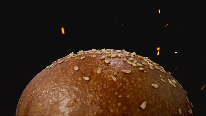 Appetizing Burger On Black Background With Shiny Particles. | Shutterstock HD Video #1100289033