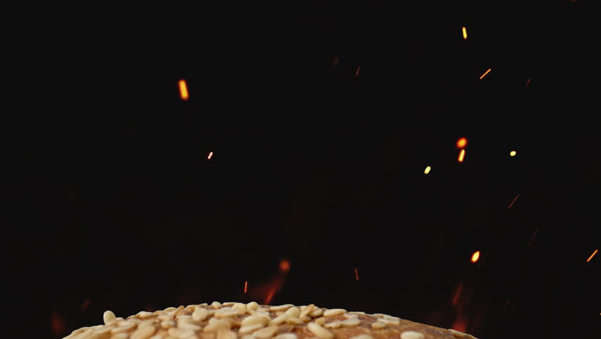 Appetizing Burger On Black Background With Shiny Particles. | Shutterstock HD Video #1100289049