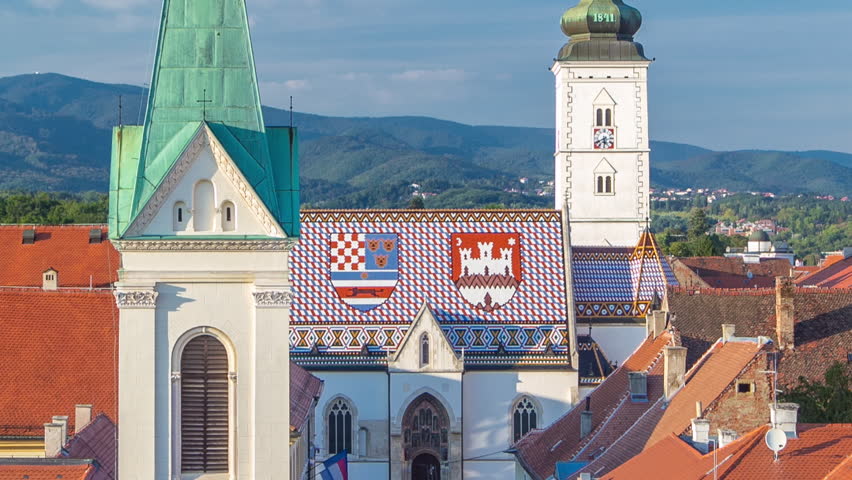 Church of St. Mark timelapse and parliament building Zagreb, Croatia. Top view from Kula Lotrscak tower viewpoint