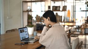 Asian girl study test computer cafe. Female student learn internet article. Woman freelancer read online news laptop. People freelance work Asia. Person use macbook prepare exam. Vlog site writer job. - Powered by Shutterstock - Get 15% off with code: PIKWIZARD15