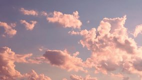 Colorful Cumulus Clouds in Blue Sky in Sunlight at Sunrise Time Lapse Clouds 4K. Beautiful Dawn Skyscraper with Floating Light Orange Lilac Puffy Clouds and Sun. Background 4K, Beauty, Heaven, Clouds. - Powered by Shutterstock - Get 15% off with code: PIKWIZARD15