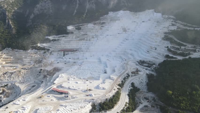 Huge Marble Quarry, heavy machines working, exploitation of marbles.