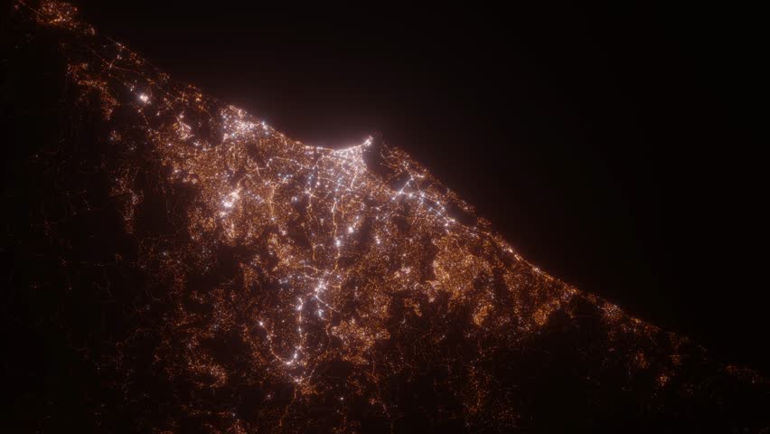 Durban (South Africa) top view at night. Aerial view on modern city from space. Camera is flying above the city, moving forward. Vertical video. The north is on the left side