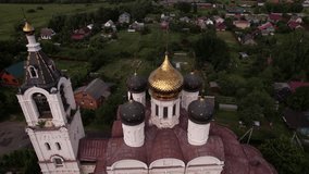 Climbing over the golden dome of an Orthodox church.