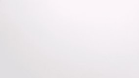 Bright colorful rainbow sprinkle ice cream topping raining down on white backdrop in slow motion - Powered by Shutterstock - Get 15% off with code: PIKWIZARD15