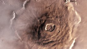 Olympus Mons on Planet Mars, the Largest Volcano in the Solar System with a Height of over 21.9 km (two and a half times the height of Mount Everest). Elements of this Video furnished by NASA.