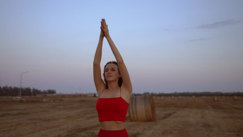 Woman doing yoga back bend pose and relaxing while exercising for mind and body balance