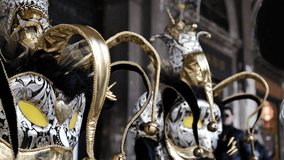 Venice - carnival masks are photographed with tourists in San Marco square - Powered by Shutterstock - Get 15% off with code: PIKWIZARD15