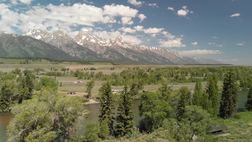 Aerial view of Grand Teton peaks, landscape and Snake River on a beautiful summer day, Wyoming - USA