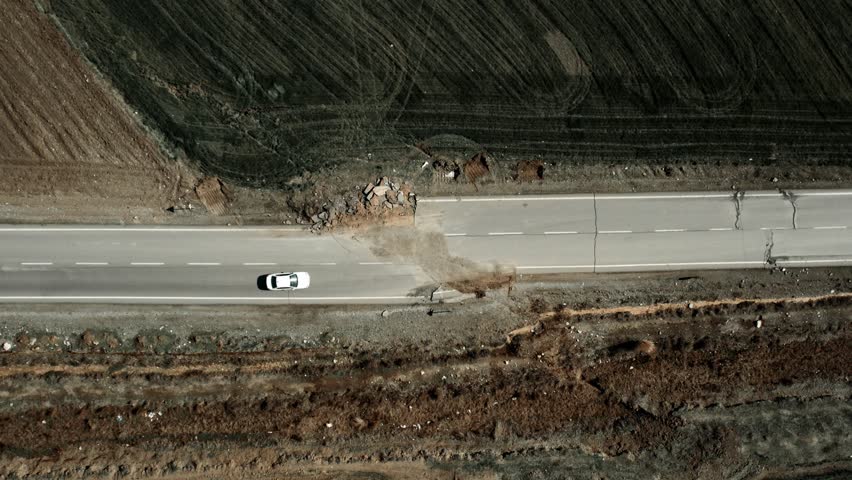 Aerial footage captures the devastating aftermath of a 7.7 magnitude earthquake that struck Turkey on February 6, 2023.  Royalty-Free Stock Footage #1100344007