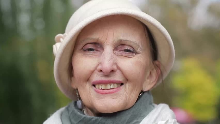 Video collage of people of different ages and races smiling and looking at the camera.  | Shutterstock HD Video #1100350485