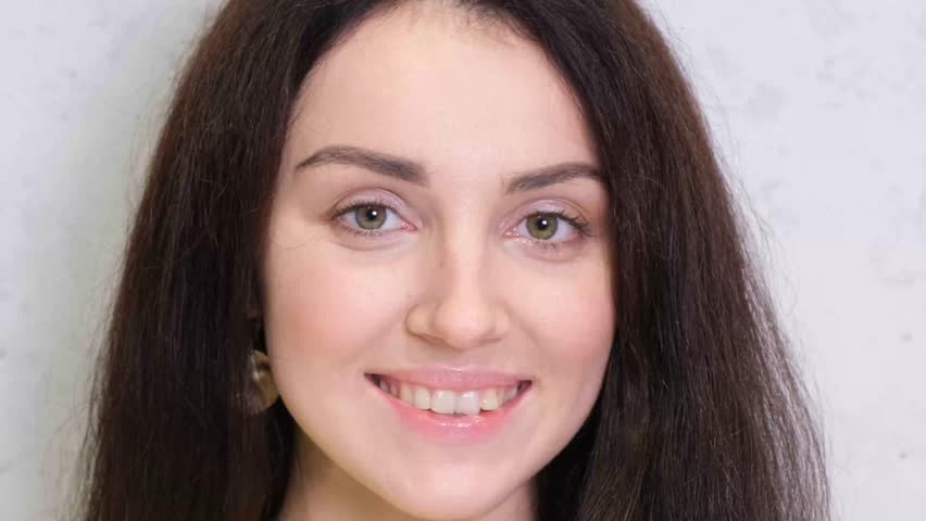 Close-up collage of people of different ages and races smiling at the camera. Social video  Royalty-Free Stock Footage #1100350489