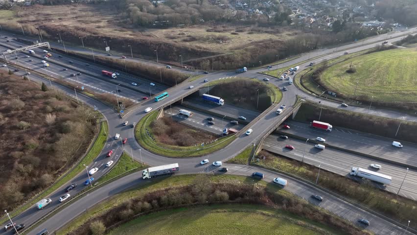 M25 Motorway Junction 21a Rush Hour Aerial View Royalty-Free Stock Footage #1100361575