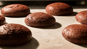 Homemade chocolate cookies baking in oven. Unhealthy food. Sugar. Brown cookies. Tmelapse. Tasty brownie. Close-up in 4K, UHD - Powered by Shutterstock - Get 15% off with code: PIKWIZARD15