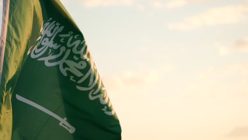 Saudi Flag. Close-up Saudi Arabia national flag waving in the wind, natural outdoor background, Slow Motion. Concept of Saudi Arabia, Flag, Waving, Celebration, National, Independence Day, Patriot Royalty-Free Stock Footage #1100367767