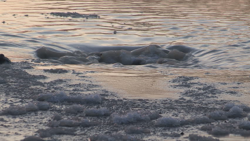 Toronto, Ontario, Canada January 2015 Broken water main flooding steam sinkhole in severe cold weather.