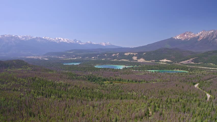 Aerial view of Jasper national park with blue lakes and blue sky glacier