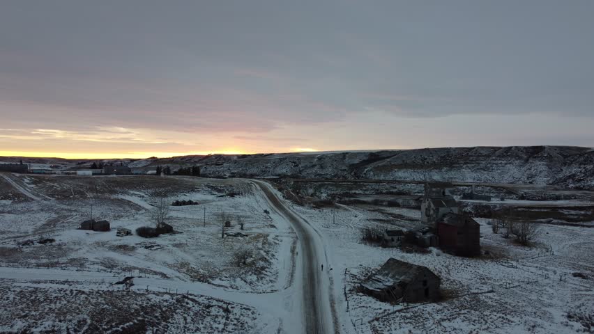 Old abandoned graine elevator in the ghost town of Sharples, Alberta at sunrise