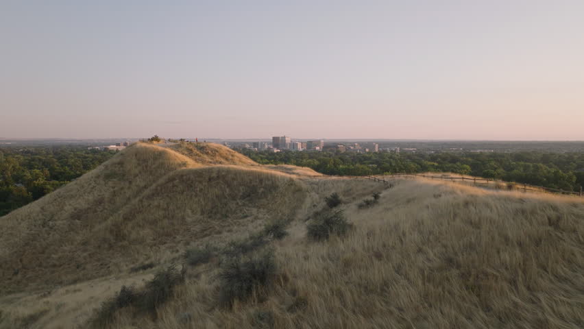 Aerial moving over Camels Back Park towards downtown Boise Idaho