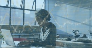 Animation of data processing over african american businesswoman working in office. Global business and digital interface concept digitally generated video.