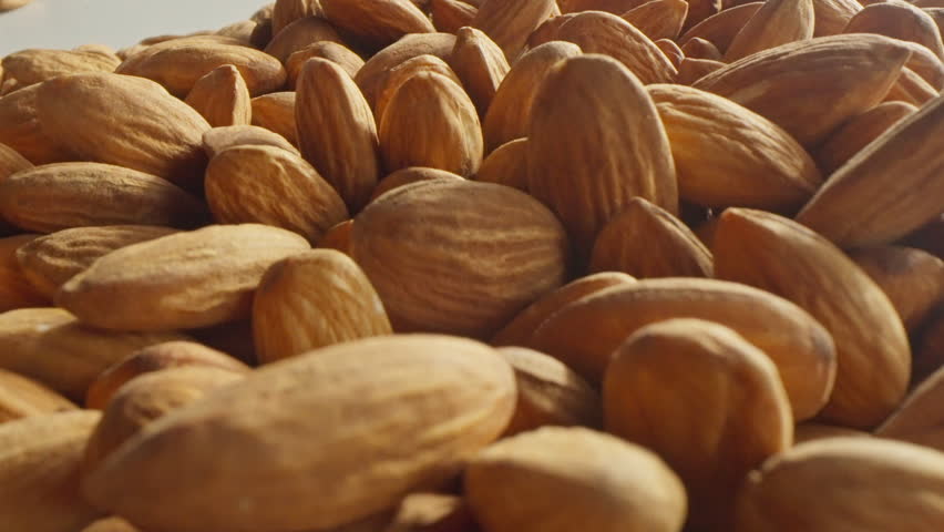 Macro shot of dry almonds | Shutterstock HD Video #1100391493