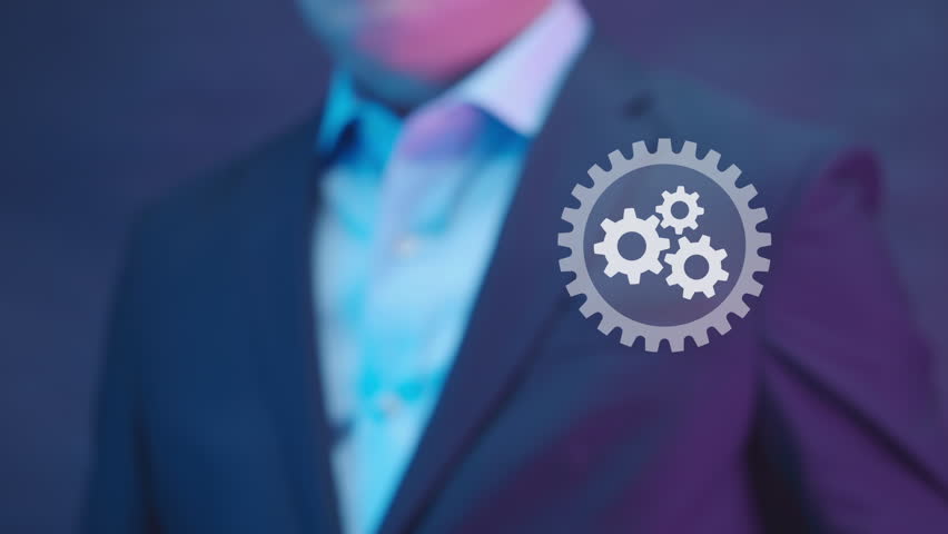 Businessman pointing virtual screen of gear cog icon present operation management involving business process, workflow, problem solving, high performance, monitoring and evaluation, quality control. Royalty-Free Stock Footage #1100396181
