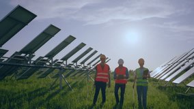 In a sunny day in front of the camera group of young ecological engineer and investors analysing the future plan of work at photovoltaic solar panels farm - Powered by Shutterstock - Get 15% off with code: PIKWIZARD15