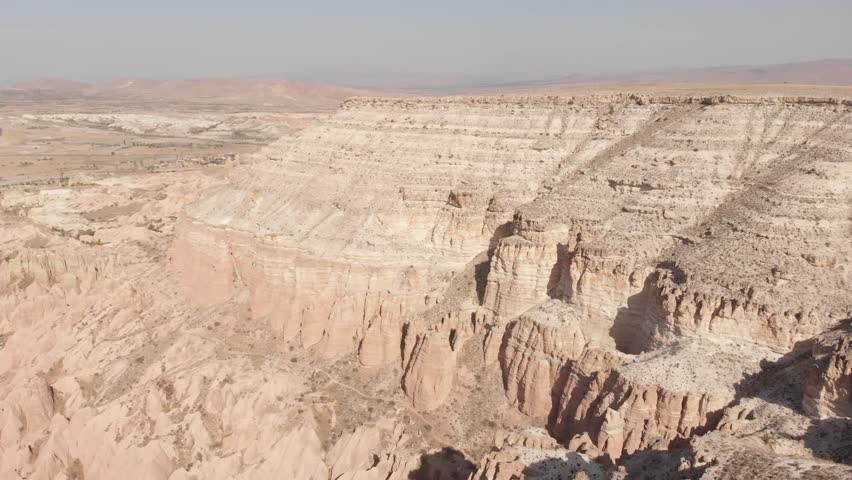 Aerial view Canyons in Cappadocia landscape high altitude 4K Dlog panorama