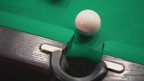 the player pockets the billiard ball. real-time video High-quality FullHD video recording.