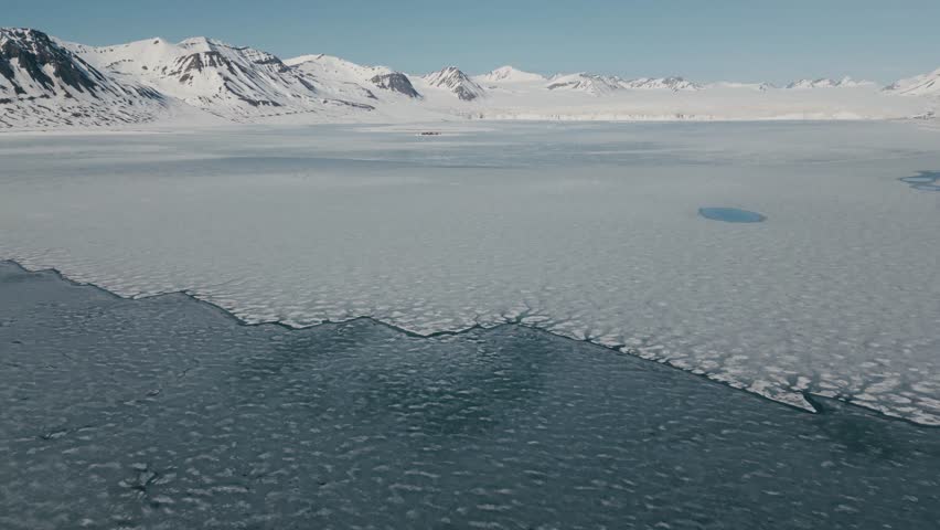 Aerial view of a landscape in the Svalbard-Spitsbergen archipelago. | Shutterstock HD Video #1100408207
