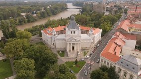 Aerial footage of the Cultural palace in Arad, Romania. Video was shot from a drone with the camera pointed downwards for a top shot and flying closer to the building.