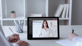 Video report. Virtual meeting. Remote presentation. Female business team working online with charts graphs using tablet at digital office. - Powered by Shutterstock - Get 15% off with code: PIKWIZARD15