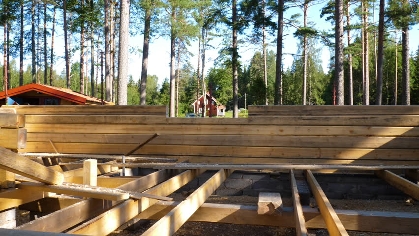 View of a log cabin under construction., a Buildings & Landmark Video by BlackBoxGuild
