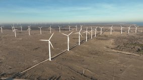 Wind turbine farm. Windmill for electric power production. Green energy. Renewable energy.  - Powered by Shutterstock - Get 15% off with code: PIKWIZARD15