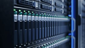 Close-up of Server Rack with SSD with Blinking Lights in Modern Datacenter. Advanced Cloud Computing and Machine Learning Concept. - Powered by Shutterstock - Get 15% off with code: PIKWIZARD15