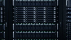 Front VIew of Server Rack with Blinking Lights in Modern Datacenter. Advanced Cloud Computing and Machine Learning Concept. - Powered by Shutterstock - Get 15% off with code: PIKWIZARD15