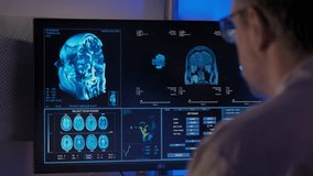 Man Doctor analyzing MRI in a hospital office. - Powered by Shutterstock - Get 15% off with code: PIKWIZARD15