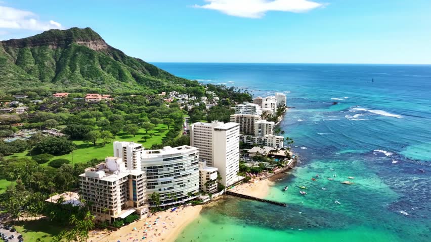 Aerial view Waikiki beach Hawaii, Drone Honolulu city skyline. Famous American vacation tourism destination in Oahu island, USA. Royalty-Free Stock Footage #1100426157